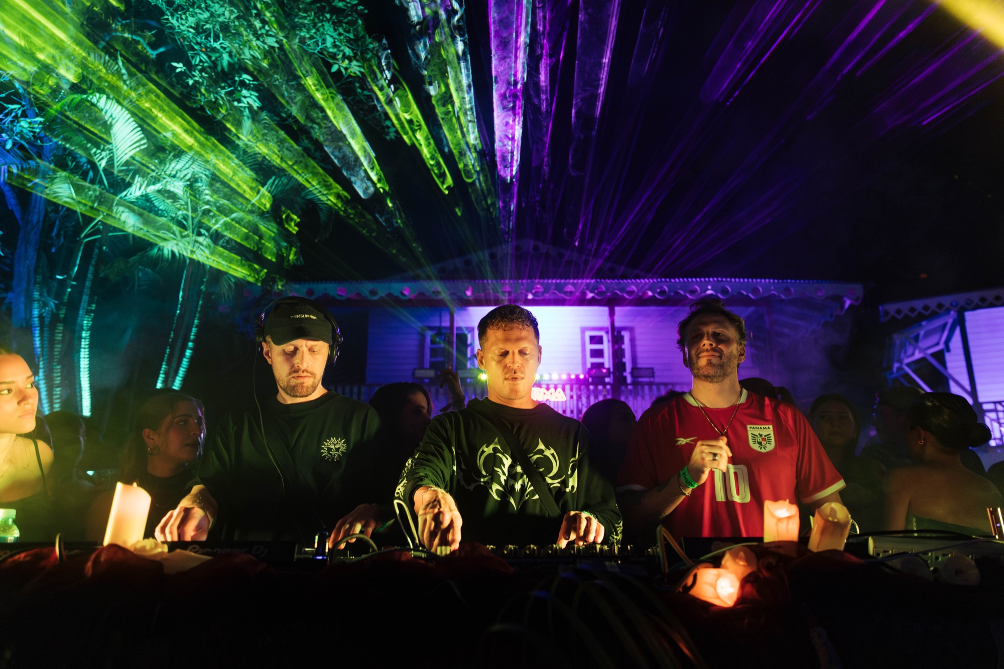 WARMA artists performing at a tropical outdoor venue